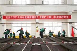 Person standing in a factory with machinery in the background